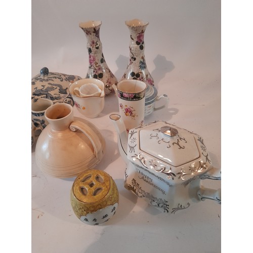 303 - A collection of ceramic items to include blue and white and a Crown Ducal Waxy Glaze jug number 259.