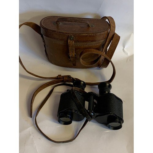 339 - A Pair Of Army Pattern 3 Stereo Prismatic Binoculars In A Leather case.