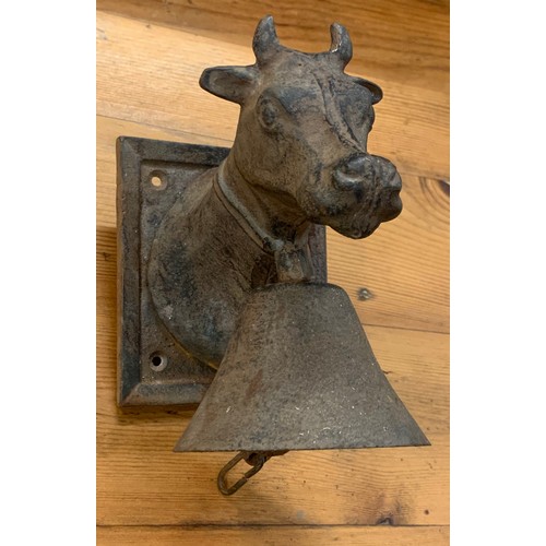 355 - Cast Metal Wall Mounting Bell In The Form Of A Cow .