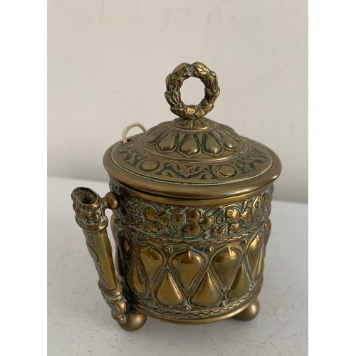 146 - 19thC Brass String Holder Having Relief Decoration And Reg no. 67233
8 cms diameter x 12 cms h