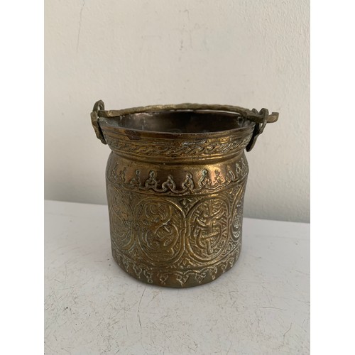 147 - Vintage Bronze Islamic Pot With Handle
9 cms diameter x 15 cms h (incl handle)