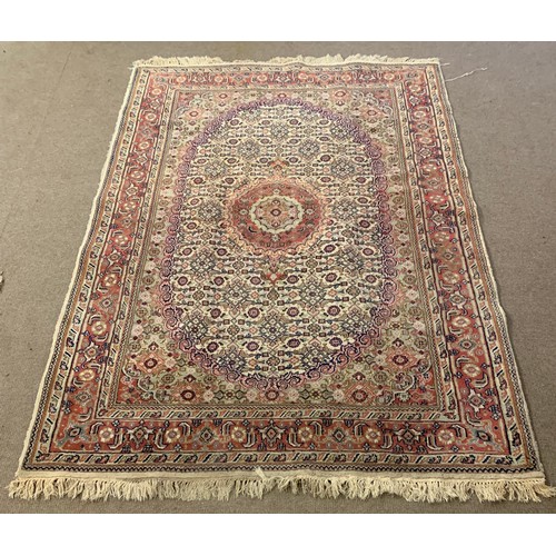 69 - Large Decorative Oriental Hand Tied Ground Rug. 255 x 164 cms