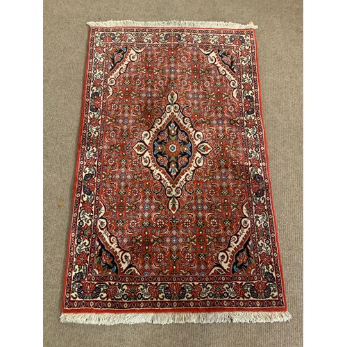 60 - Decorative Ground Rug With Central Lozenge. 123 x 73 cms