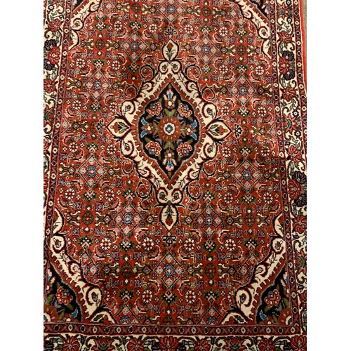 60 - Decorative Ground Rug With Central Lozenge. 123 x 73 cms