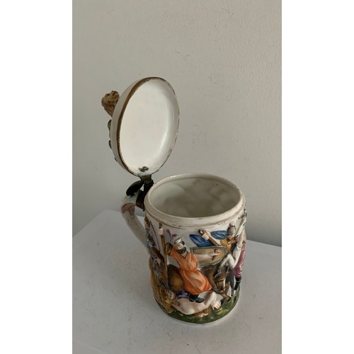 102 - Vintage Capodimonte Large Porcelain Tankard Having Lion Finial
11 cms diameter x 21 cms h