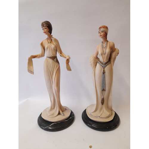 389 - Pai of Composite art deco style figures on marble base 37cm 
 and 34cm tall