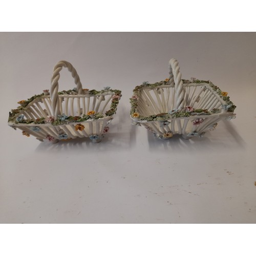 396 - 2 x porcelain Bon Bon baskets with decorative flowers 13cm x 13cm and 15cm x 12cm