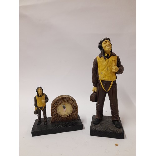 405 - 2 x resin figures of Airmen, one standing alongside a clock , tallest 27cm