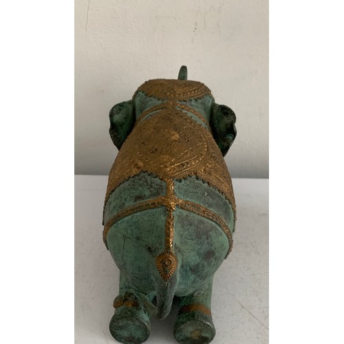 120 - Large Vintage Bronze Statue Of An Elephant Having Gilt Saddle And Head Decoration
21 x 12 cms h