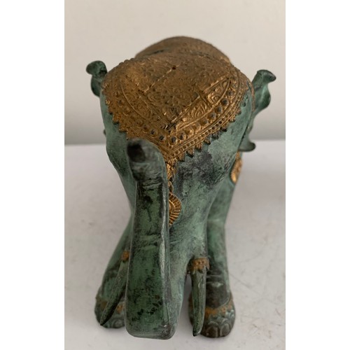 120 - Large Vintage Bronze Statue Of An Elephant Having Gilt Saddle And Head Decoration
21 x 12 cms h