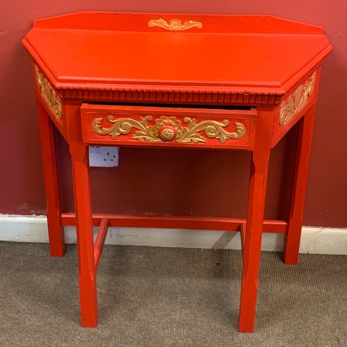 11 - Red And Gilt Painted Hall Table With Central Drawer. 87 x 39 x 82 cms