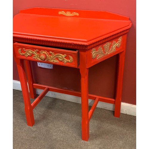 11 - Red And Gilt Painted Hall Table With Central Drawer. 87 x 39 x 82 cms