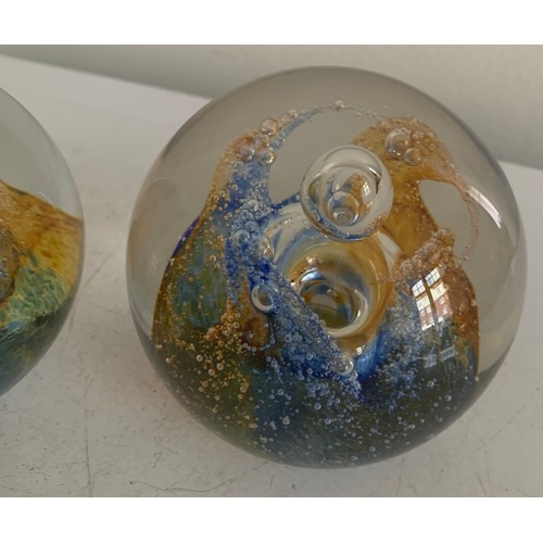 129 - Pair Of Caithness Glass Paperweights Signed
8 cms diameter