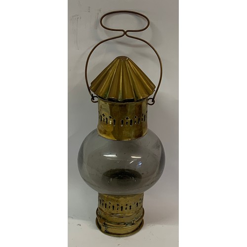 171 - A Vintage Brass And Glass Nautical Lamp With Internal Burner . 34 cms High Without Handle.