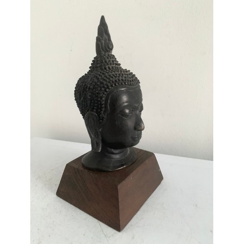 204 - Bronze Buddha Head ( base not included)
15 cms h