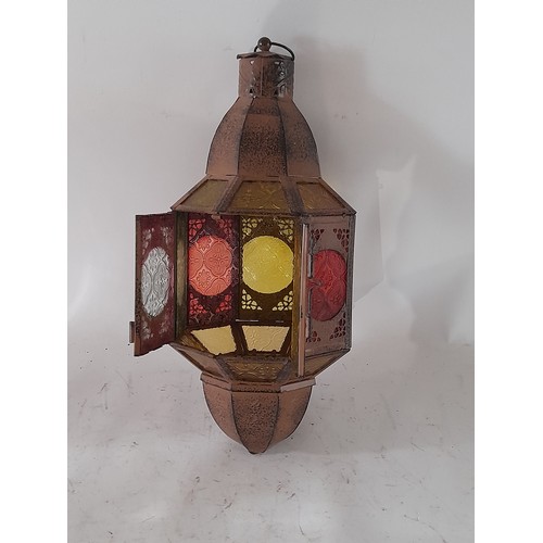 37 - Moroccan style latern with stained glass and double opening doors for access to place/light candle. ... 