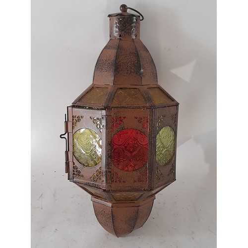 37 - Moroccan style latern with stained glass and double opening doors for access to place/light candle. ... 