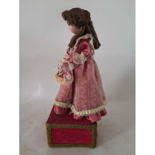 58 - Musical Automaton doll. 39cm high