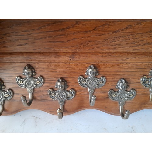 65 - Continental Coat hanger shelf with 7 hangers. 65cm wide x 2cm high