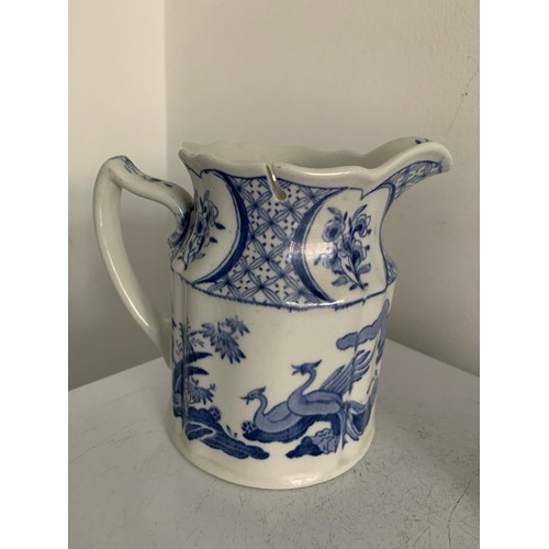 139 - 2 x Vintage Blue And White Jugs
13 cms h and 15 cms h