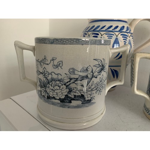 140 - 2 x Vintage Blue And White Loving Cups Together With A Large French Quimper Jug
Loving cups 13 cms h... 