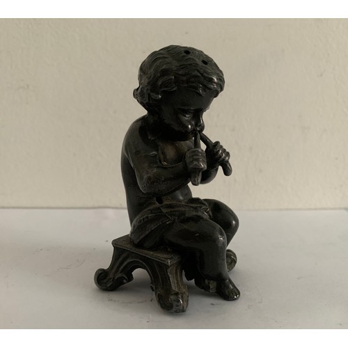 224 - 19thC Antique Pepperette In The Form Of A Pipe Playing Cherub
8 cms h