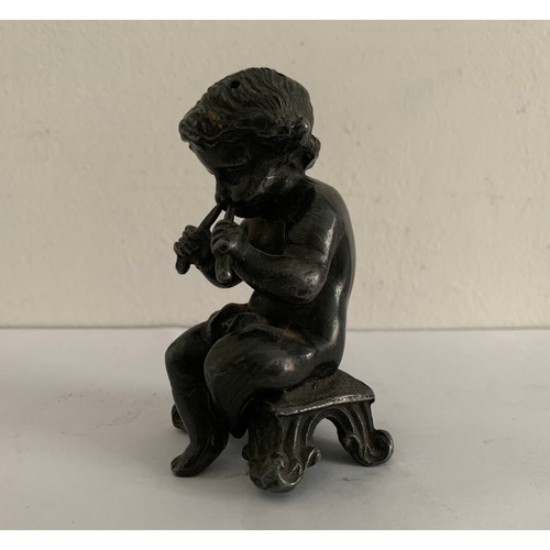 224 - 19thC Antique Pepperette In The Form Of A Pipe Playing Cherub
8 cms h