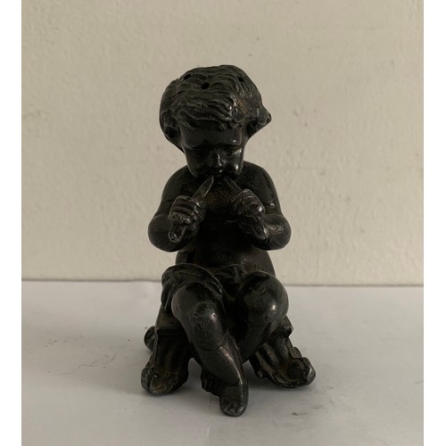 224 - 19thC Antique Pepperette In The Form Of A Pipe Playing Cherub
8 cms h