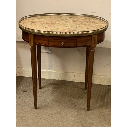 39 - French Oval Marble Top Table With Central Drawer And Brass Gallery.72 x 55 x 74 cms