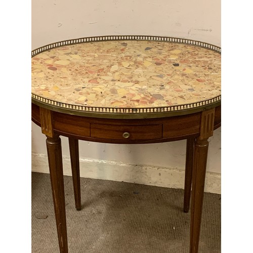 39 - French Oval Marble Top Table With Central Drawer And Brass Gallery.72 x 55 x 74 cms