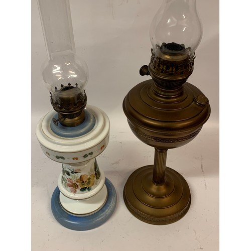 282 - Two Antique Oil Lamps Both In Original Condition Tallest 61 cms High (2)