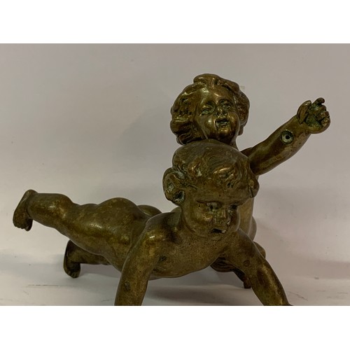 304 - Pair Of Antique Bronze Cherub Figures. Largest 12 cms Long. (2)