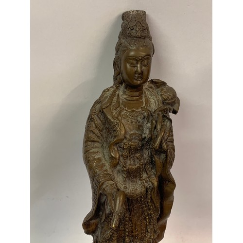 306 - Bronze Buddha Figure Standing On A Lotus Flower. 34 cms High