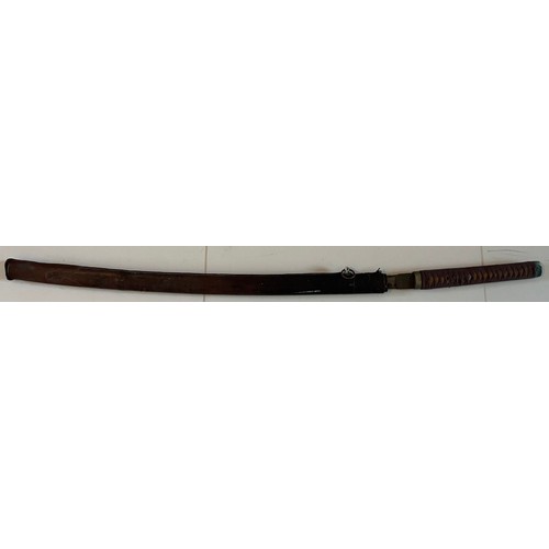 373 - A Early Samurai Sword In Wood Scabbard. Blade Sticks In Scabbard. Overall Length 107cms