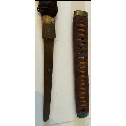 373 - A Early Samurai Sword In Wood Scabbard. Blade Sticks In Scabbard. Overall Length 107cms