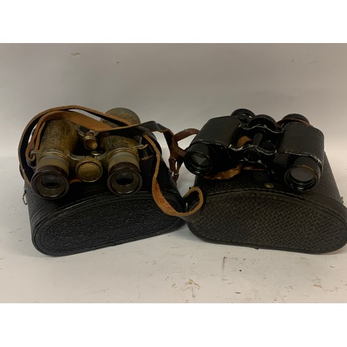 411 - A Pair Of  Voigtlander Braunschweig Field Binoculars Along With One Other Both Cased. (2)