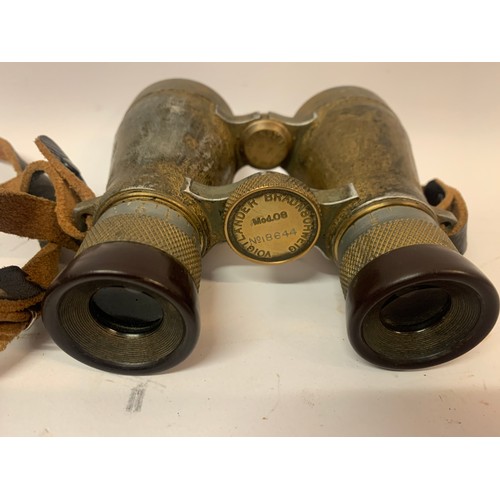 411 - A Pair Of  Voigtlander Braunschweig Field Binoculars Along With One Other Both Cased. (2)