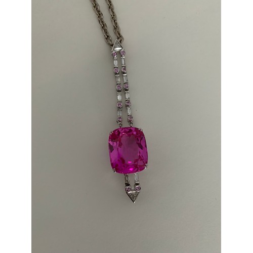 355 - Pink Stone Pendant In A 18ct Mount Along With A 18ct  Necklace