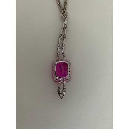 355 - Pink Stone Pendant In A 18ct Mount Along With A 18ct  Necklace