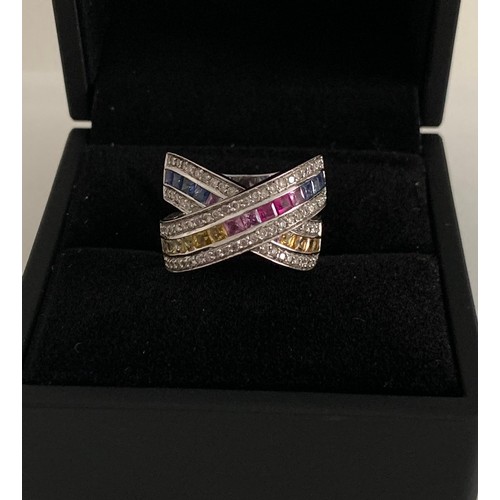 347 - Blue Pink Yellow Sapphires Set In Diamonds In 18ct White Gold Ring
10.2 g. Size N