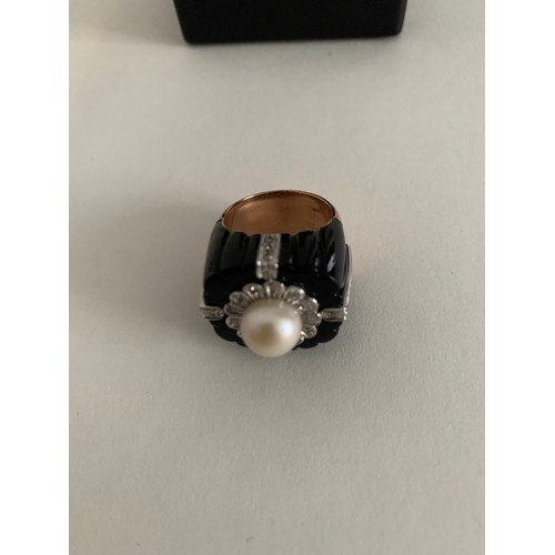 353 - 18ct Gold Ring Having A Central Pearl Set In Jet With Brilliant Cut Diamonds
12.8g.Size P