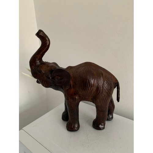 213 - Vintage Leather Elephant (front leg in need of repair)
33 x 12 x 34 cms h