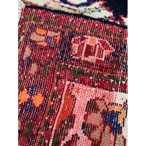 83 - Hand Made Iranian Rug. 140 x 98 cms Small