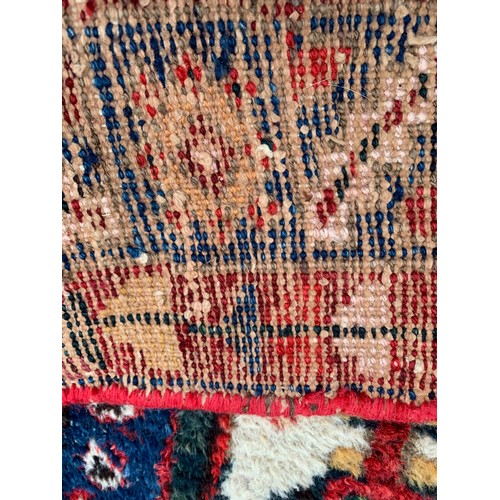 86 - Hand Made Ground Rug With Central Pattern 184 x 127 cms