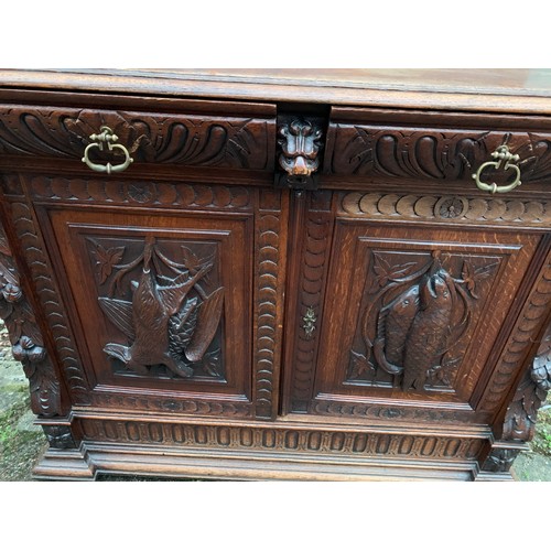 73 - Flemish Carved Wood Decorated Hunt Cupboard / Buffet With Removable Back Panel With Lion Head Carvin... 