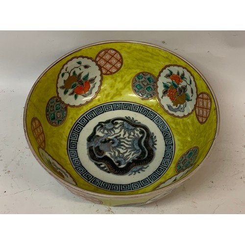 485 - Chinese Yellow Ground Bowl With Hand Painted Decoration. 28.5 cms Diameter.