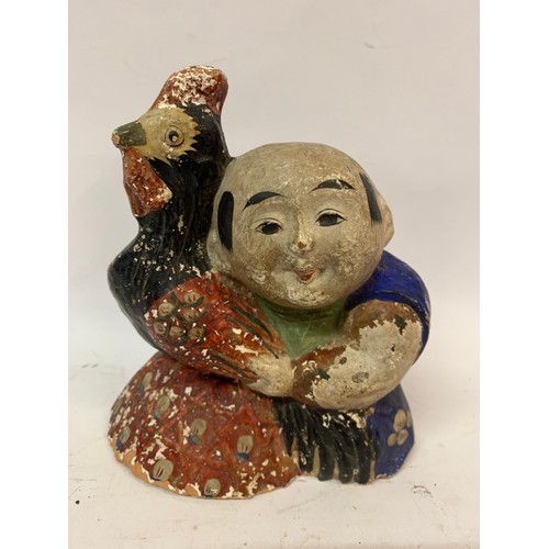 500 - Chinese Pottery Figure Of A Man Holding His Cockerel.  16 cms High