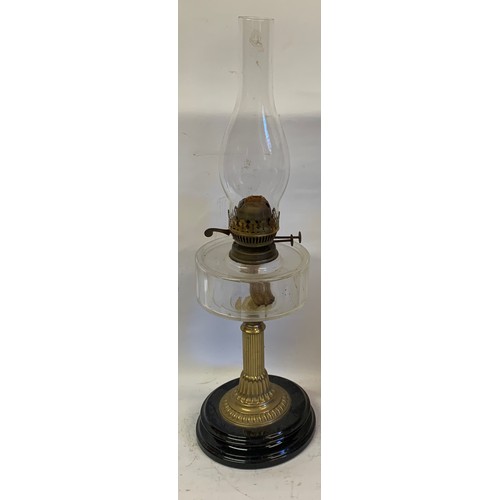 537 - Antique Oil Burning Lamp. 61 cms High