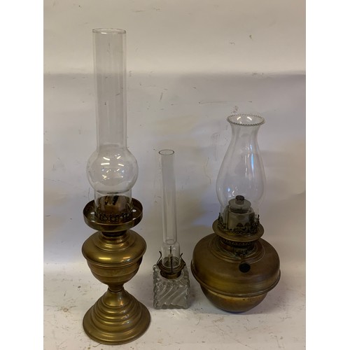 382 - Three Antique Oil Burning Lamps. Tallest 56 cms (3)