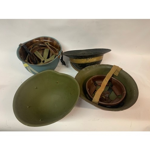 302 - Four Military Tin Helmets (4)